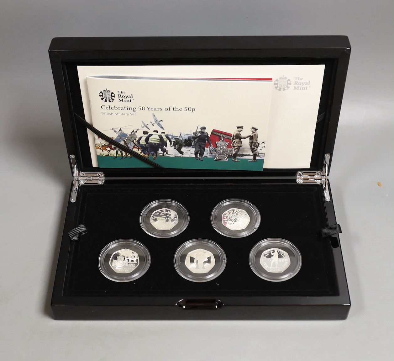 UK Royal Mint commemorative silver proof five 50p coin set, 'Celebrating 50 years of the 50p British Military set', limited edition number 137 of 1969, cased with certificate